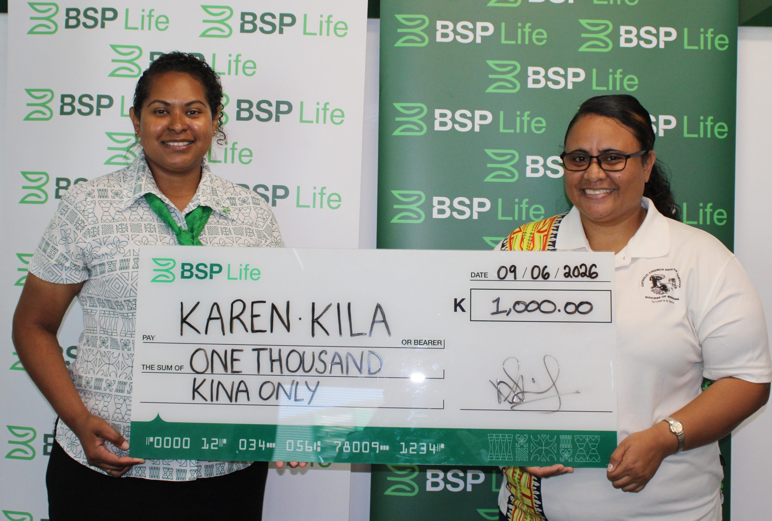Picture Caption (L-R)_BSP Life PNG, Business Development Manager - Adelaide Senior with winner Karen Kila in Port Moresby
